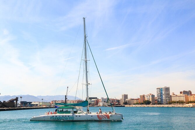 Bay of Malaga Catamaran Sailing - Looking up to the Alcazaba and Gibralfaro Castle