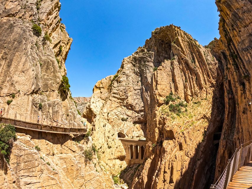 Caminito del Rey: Guided Tour and Entry Ticket - Cliffs, river views, and the final bridge