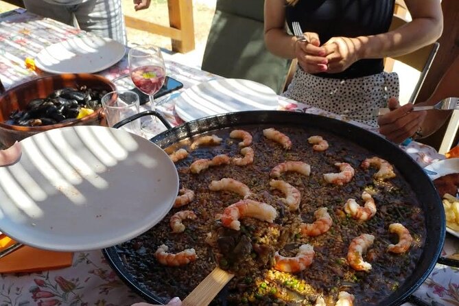 Chefcooking Paella from our Andalusian Grandmother at a Family Farm - A farm lunch with paella at its center