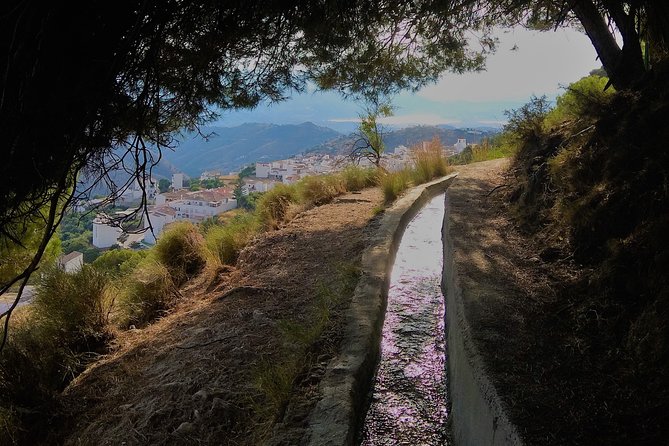El Saltillo Gorge and White Village Hiking Tour from Malaga - Following the Arabic irrigation canal