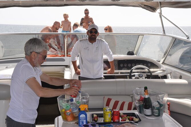 Enjoy the Marbella Coast on the Sunseeker 63 Predator Yacht - Paddle surfing, snorkeling, and bathroom stops