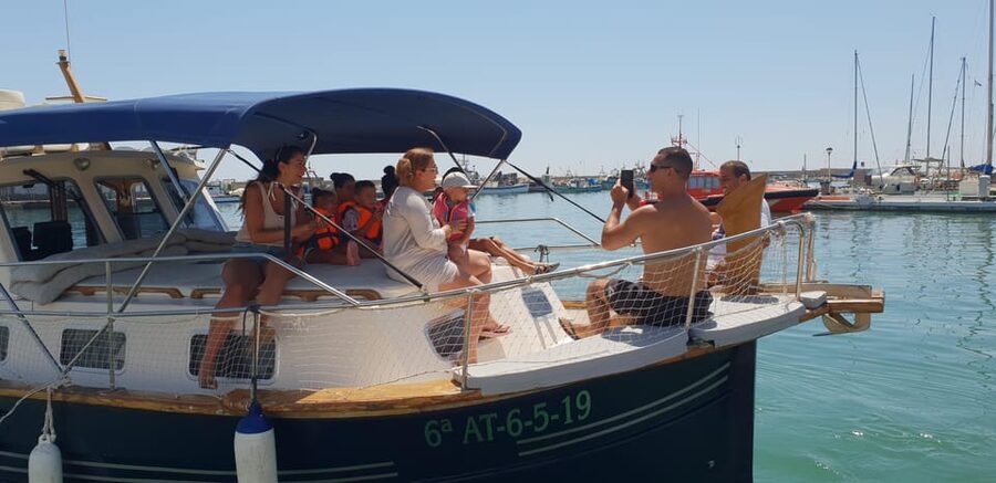 Estepona: Dolphin Search Boat Trip with Drink and Snacks - Swimming in the bay