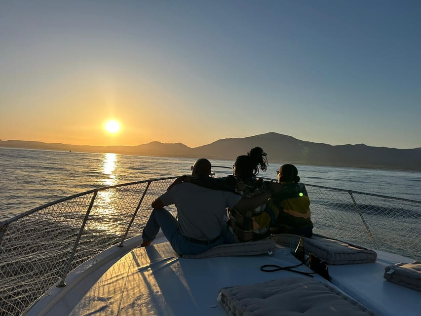 Estepona: Dolphin Searching Sunset Cruise with Drink & Snack - The Viking 40 and the giant deck mat