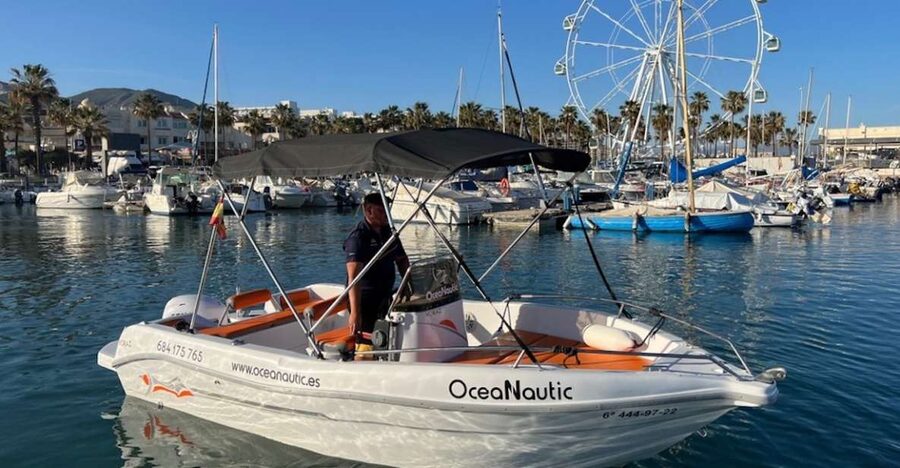 From Málaga: Boat Rental with No License Required - Taking the helm outside Málaga harbor