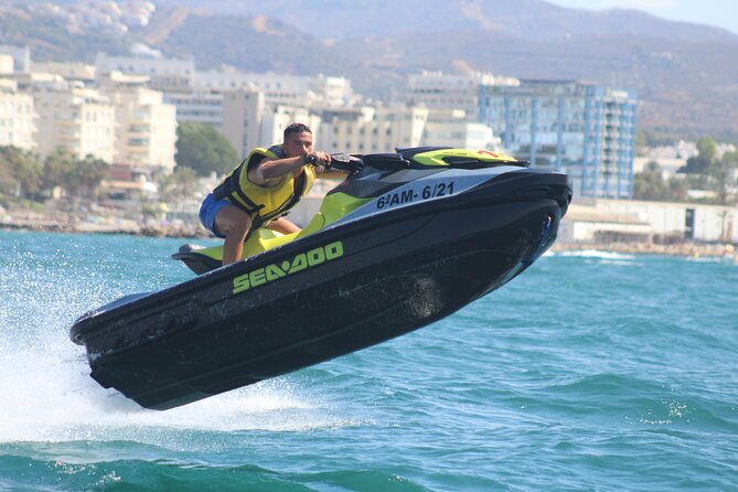Guided JETSKI tour along the coast of Marbella, enjoy 30 minutes or 1 hour - Getting ready with a life vest and neoprene