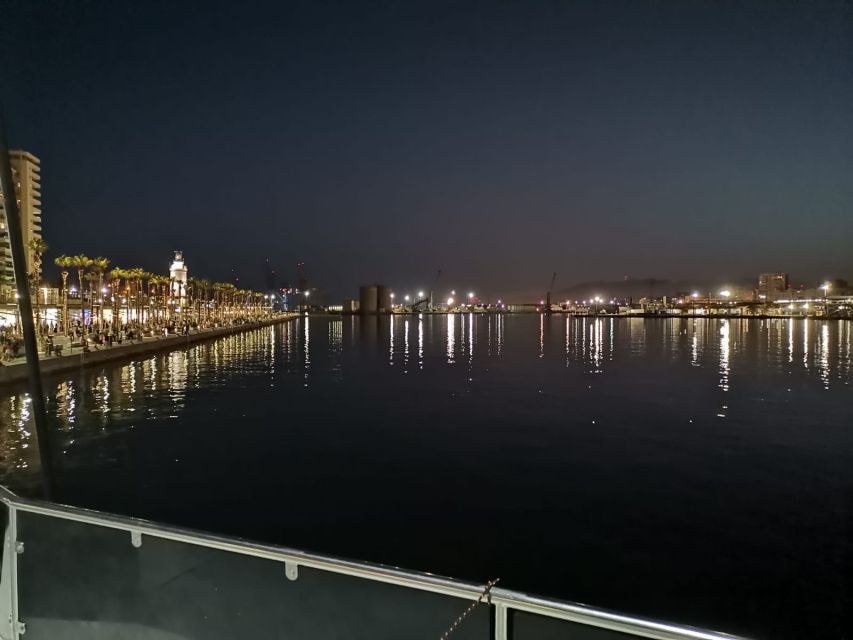 Malaga: A Sea of Stars Nighttime Stargazing Catamaran Tour - Leaving Malaga after sunset