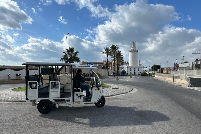 Malaga by Tuk Tuk i : 1 or 2 hours Private city tour - La Farola and the port entrance