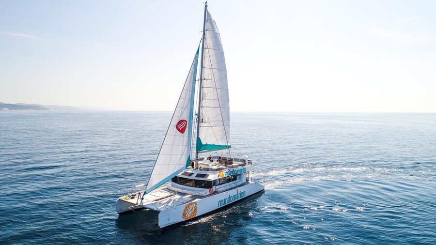 Malaga: Catamaran Sailing Cruise with Swimming & Optional DJ - Sailing, or a motor-powered cruise?