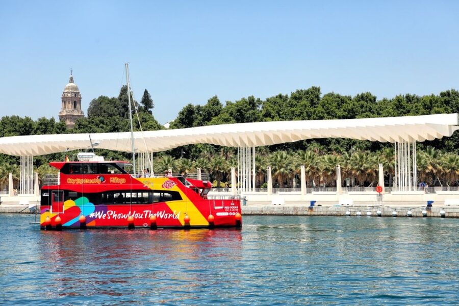 Malaga: City Sightseeing Hop-On Hop-Off Bus Tour - Malagueta beach, the bullring, and the road uphill