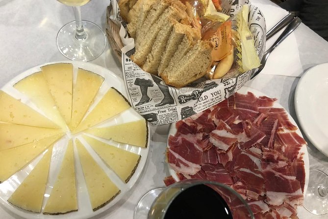 Malaga Food Tour: Tapas, Drinks and Delights with a Local - Stop three: Plaza de la Merced and Andalusian comfort food