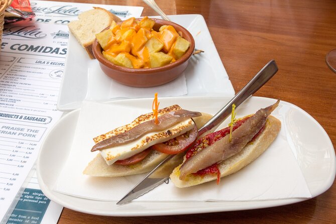 Malaga Food Tour: Tapas, Drinks and Delights with a Local - Food, drinks, and what is actually included