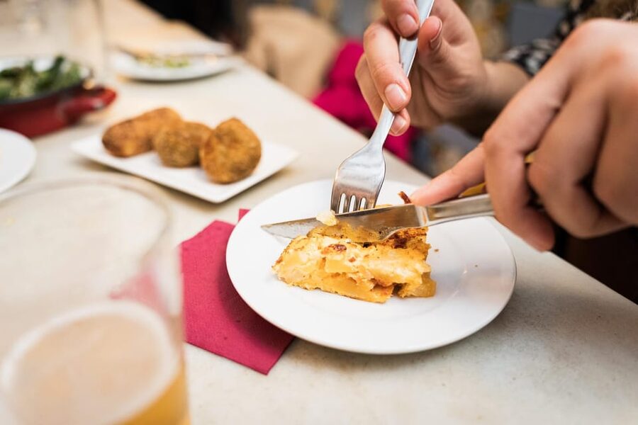 Malaga: Food Tour with Local Guide, Tapas, and Drinks - Stop three: slow-cooked meat and Málaga’s inland flavors