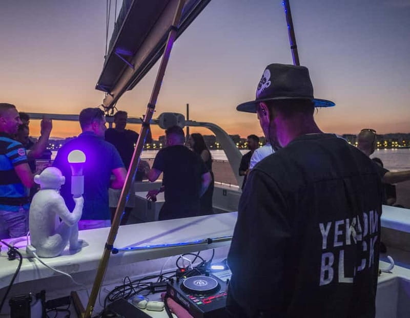 Malaga: Sailing Catamaran Sunset Cruise with Live DJ & Drink - The sunset view from the Alboran Sea