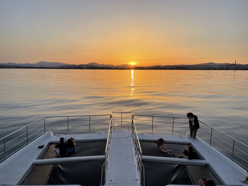 Málaga: Sunset Catamaran Trip - Leaving Málaga Port as the City Slips Behind