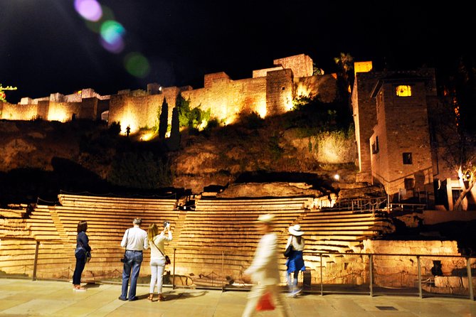 The Alcazaba and the Roman theatre lit above Málaga&rsquo;s old town after dark