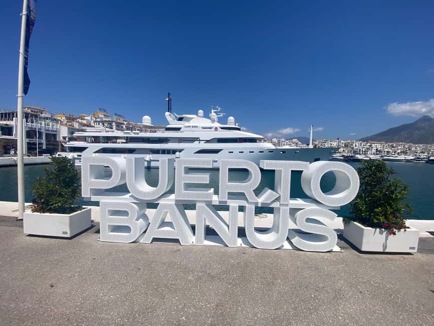 Marbella: Puerto Banus Night Life Walking Tour - Puerto Banús at night, where the tour begins