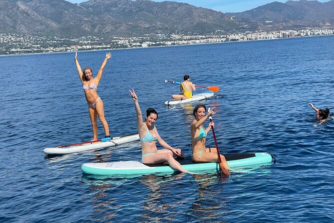 Marbella Small Group Catamaran with Dolphin Watching - Drinks, music, and the return to port