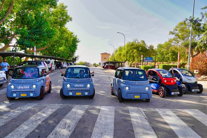 Montes de Málaga Gastronomic Tour by Electric Car - Passing the cathedral, museums, and the port area