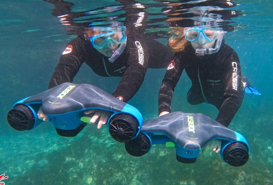 Nerja-Maro: Snorkeling & Sea Scooter Speedboat Trip - Taking turns on the sea scooter