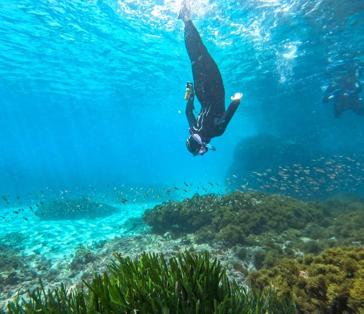 Nerja-Maro: Snorkeling & Sea Scooter Speedboat Trip - Getting comfortable with the snorkeling gear