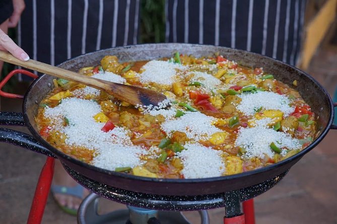 Paella & Arroz Course in the Breathtaking Montes de Malaga - Cooking arroz in the Montes de Malaga