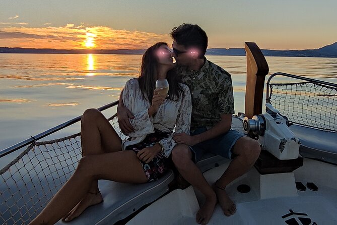 Sunset Boattrip + Tapa + Cava - Watching the coast turn gold, pink, and blue