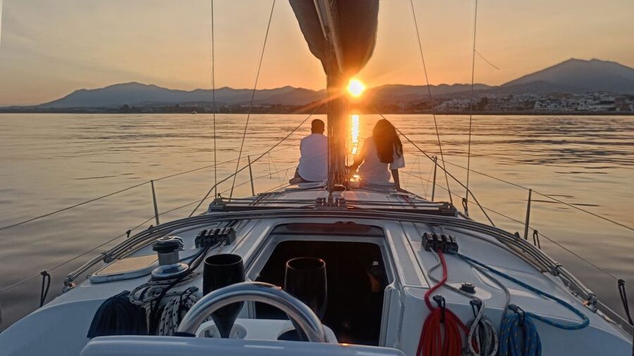 Sunset Sailing in Private Sailboat Puerto Banus Marbella - Leaving Playa Puerto Banús as daylight fades