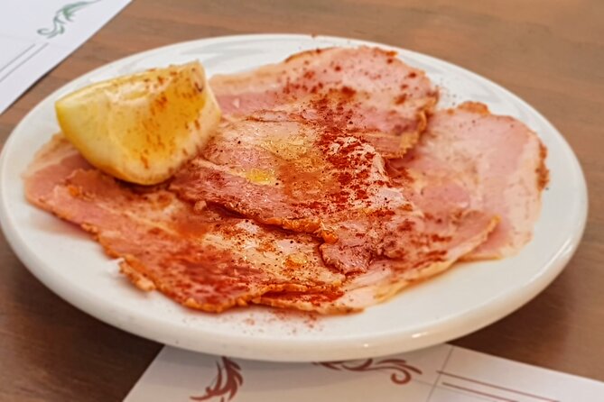 Taste of Malaga Tour : Tapas, History and Local Customs - An ultramarinos introduces old-school Spanish food culture
